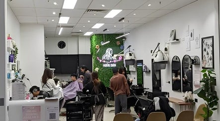 Interior of Hair Day salon in Victoria Park, Western Australia, AU showcasing chic decor and styling stations.