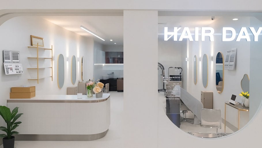 Elegant interior of Hair Day salon in East Victoria Park, Western Australia, featuring modern decor and mirrors.