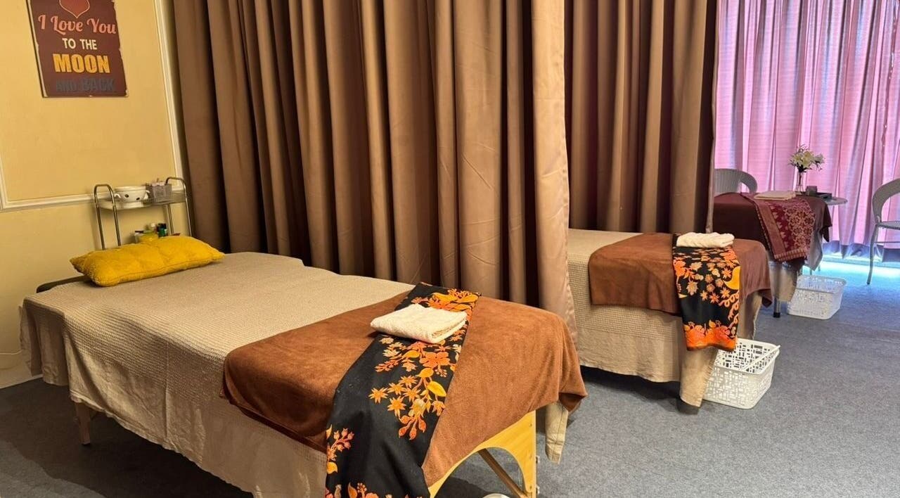 Cozy treatment room at Bidan Cantik Spa in Sungai Petani, Kedah, MY with warm decor and massage beds.
