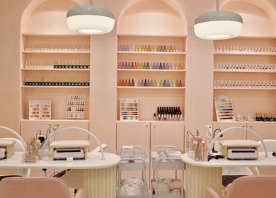 Blooming Nails Beauty Studio in Bacoor, Calabarzon, PH features elegant nail polish displays and cozy workstations.