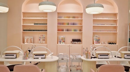 Blooming Nails Beauty Studio in Bacoor, Calabarzon, PH features elegant nail polish displays and cozy workstations.