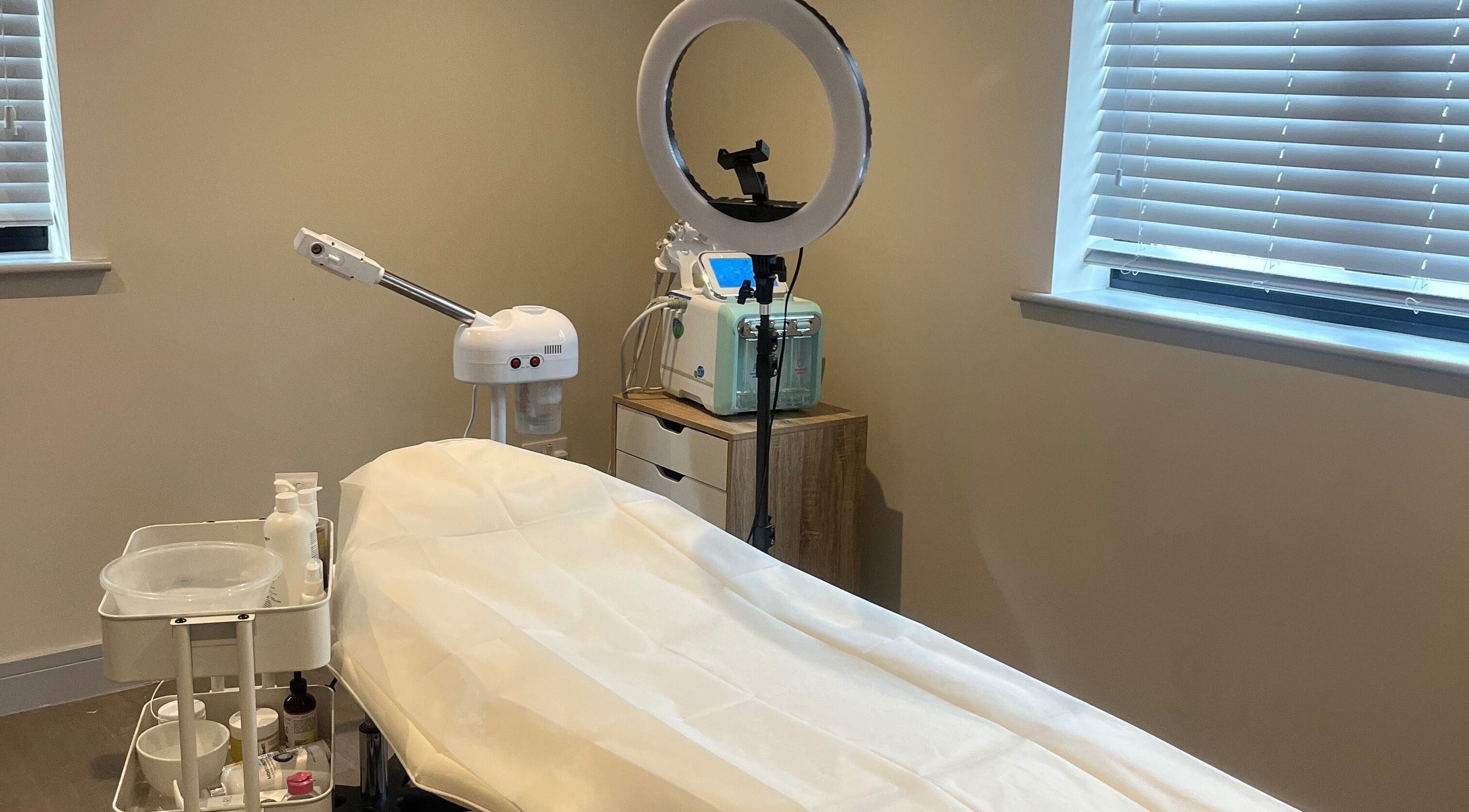 Serene treatment room at Skin Space, Stevenage, England, GB featuring a cozy setup with aesthetic equipment.