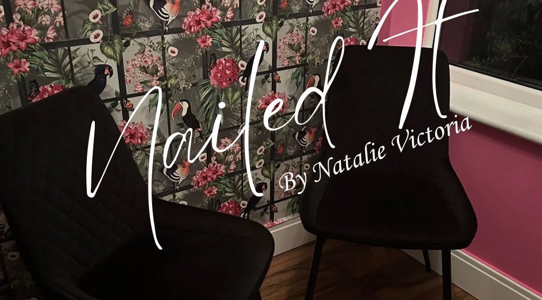 Elegant seating area at Nailed It by Natalie Victoria, Doncaster, England, GB with floral wall design.