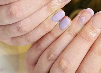 Elegant lavender nail art at LJM Beauty, St Helens, England, GB showcasing skilled manicure technique.