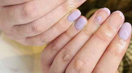 Elegant lavender nail art at LJM Beauty, St Helens, England, GB showcasing skilled manicure technique.