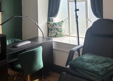 Chic beauty station at Lumière by Brooke-Leigh, Chipping Sodbury, England, GB, with green accents and comfortable seating.