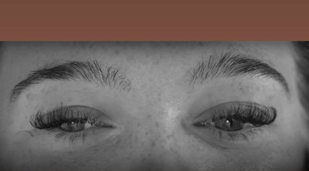 Close-up of expertly applied eyelash extensions at TLC Bombshell Beauty in Bradford, England, GB.