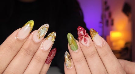Elegant nail art designs at Yorrnails, Melbourne, Victoria, AU, showcasing vibrant colors and intricate patterns.