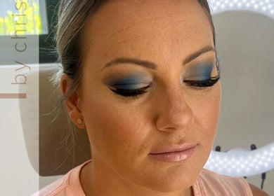 Close-up of bold blue eye makeup at Aesthetics by Christie, Rouse Hill, New South Wales, AU.