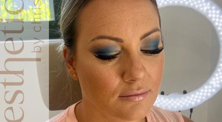 Close-up of bold blue eye makeup at Aesthetics by Christie, Rouse Hill, New South Wales, AU.