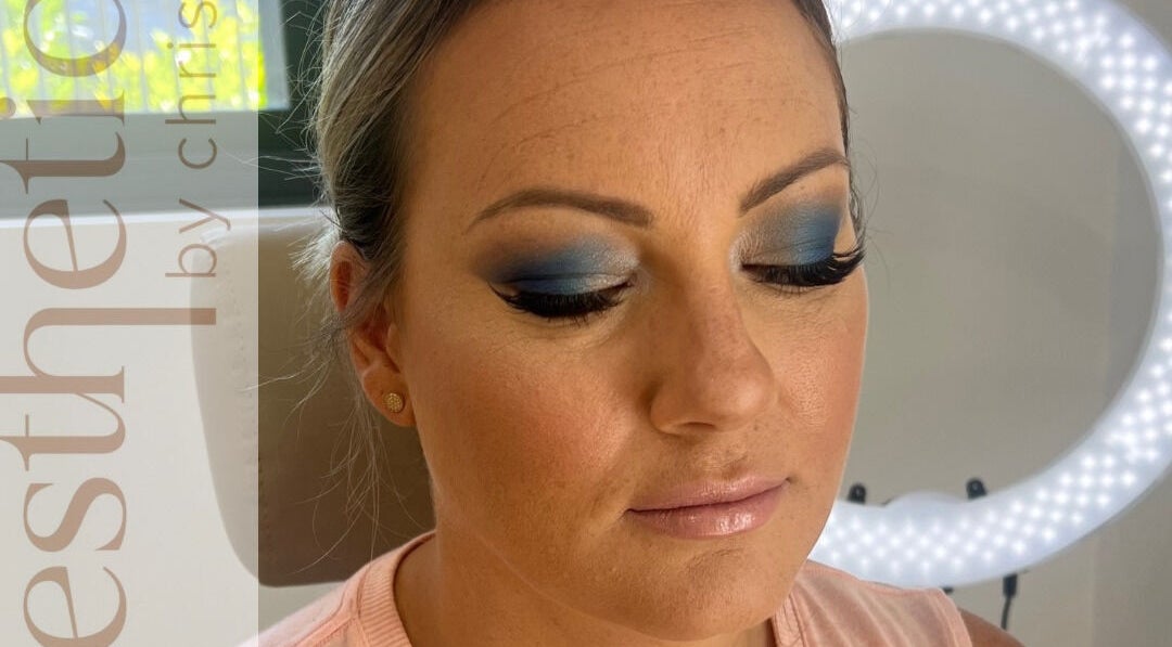 Close-up of bold blue eye makeup at Aesthetics by Christie, Rouse Hill, New South Wales, AU.