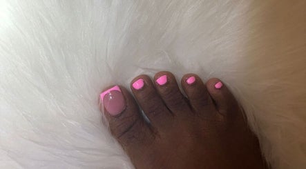 Chic pink toe nails at The Nail Candy, Cave Hill, Saint Lucy, BB on a fluffy white background.