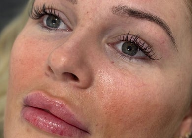 Close-up of a woman's face with flawless makeup at ByEllebeauty, Darwen, England, GB.