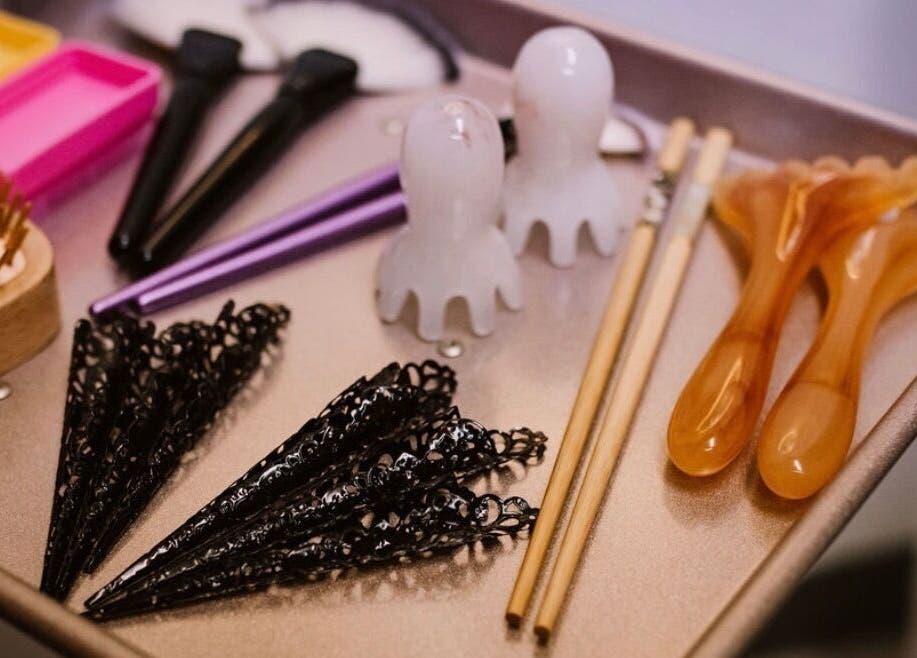 Assorted beauty tools at Scratched, Modesto, California, US, showcasing diverse wellness equipment.