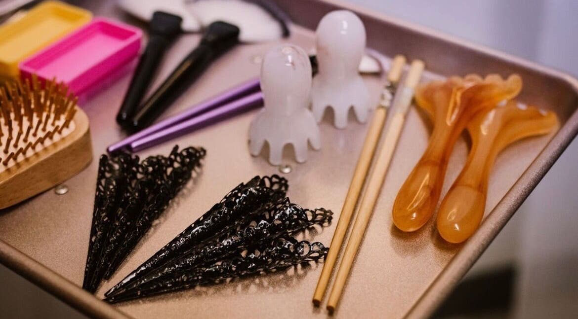 Assorted beauty tools at Scratched, Modesto, California, US, showcasing diverse wellness equipment.