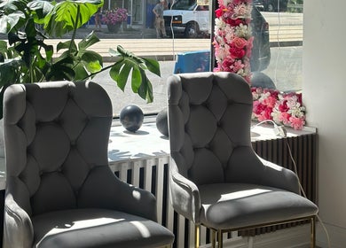 Cozy chairs and floral decor at Elavine Nail Studio, Toronto, Ontario, CA.