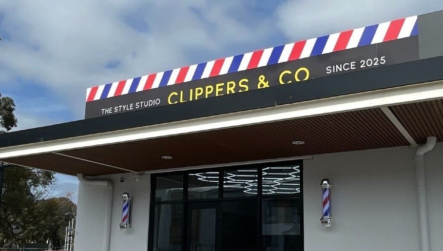 HairbyEsther-Clippers & Co facade in Paradise, South Australia, showcasing its vibrant barber sign.