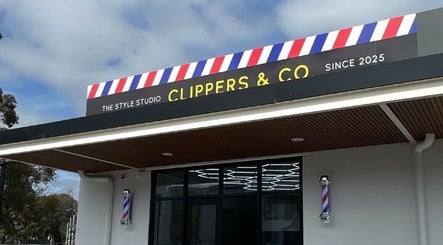 HairbyEsther-Clippers & Co facade in Paradise, South Australia, showcasing its vibrant barber sign.