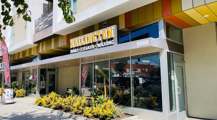 Front entrance of Nailington Nail Boutique in Los Angeles, California, US, featuring stylish signage.