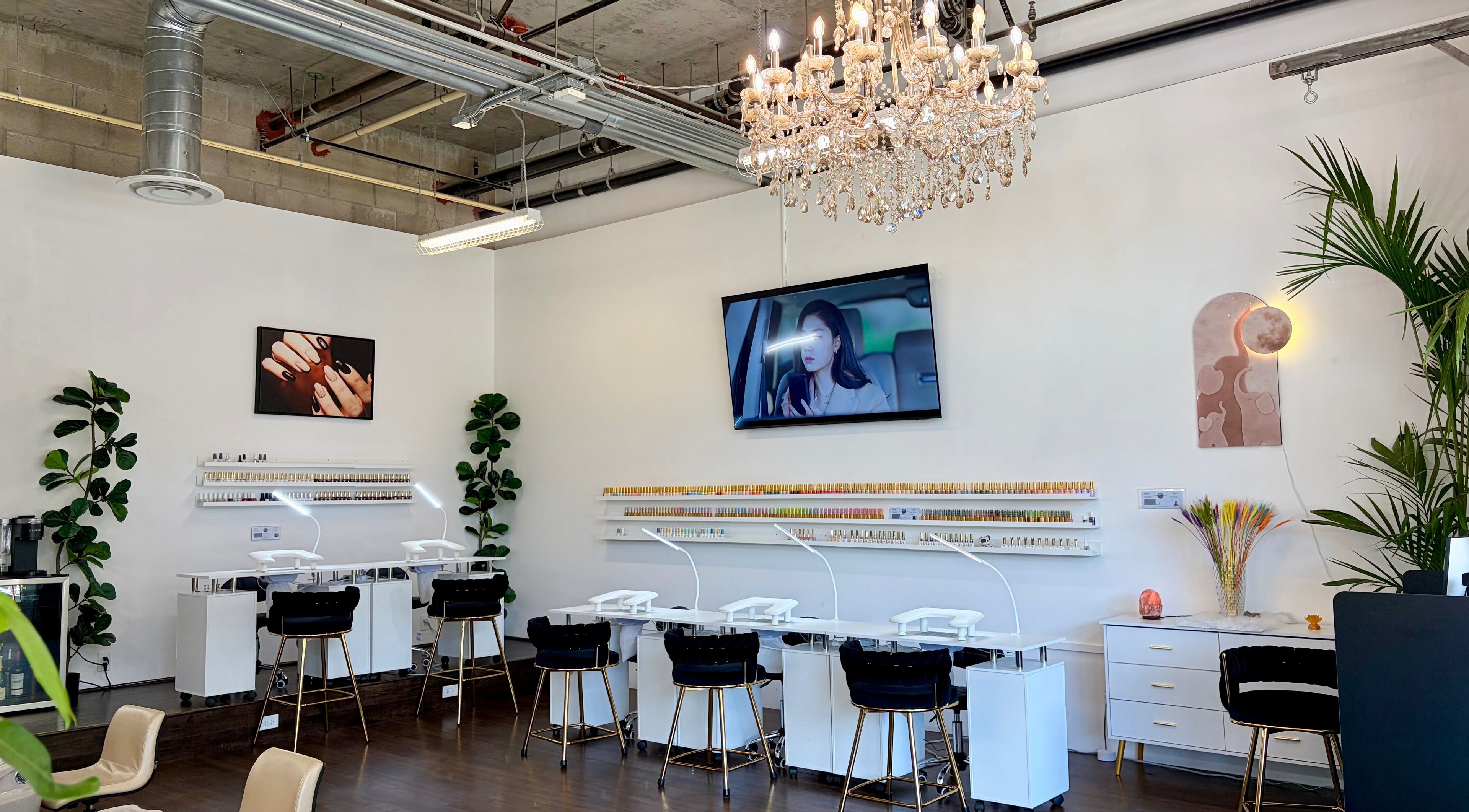 Elegant interior of Nailington Nail Boutique, Los Angeles, California, US, showcasing chic nail stations.