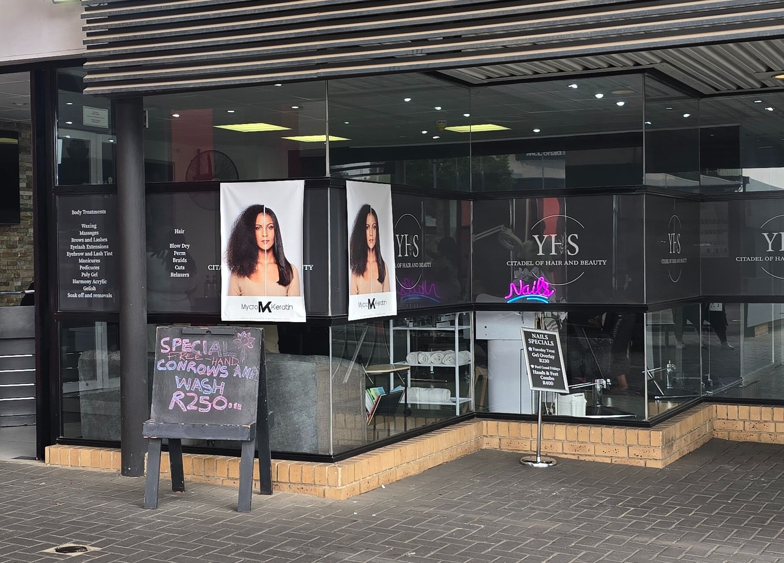 Exterior view of Legacy Heir Studio in Randburg, Gauteng, ZA featuring a sleek glass entrance.