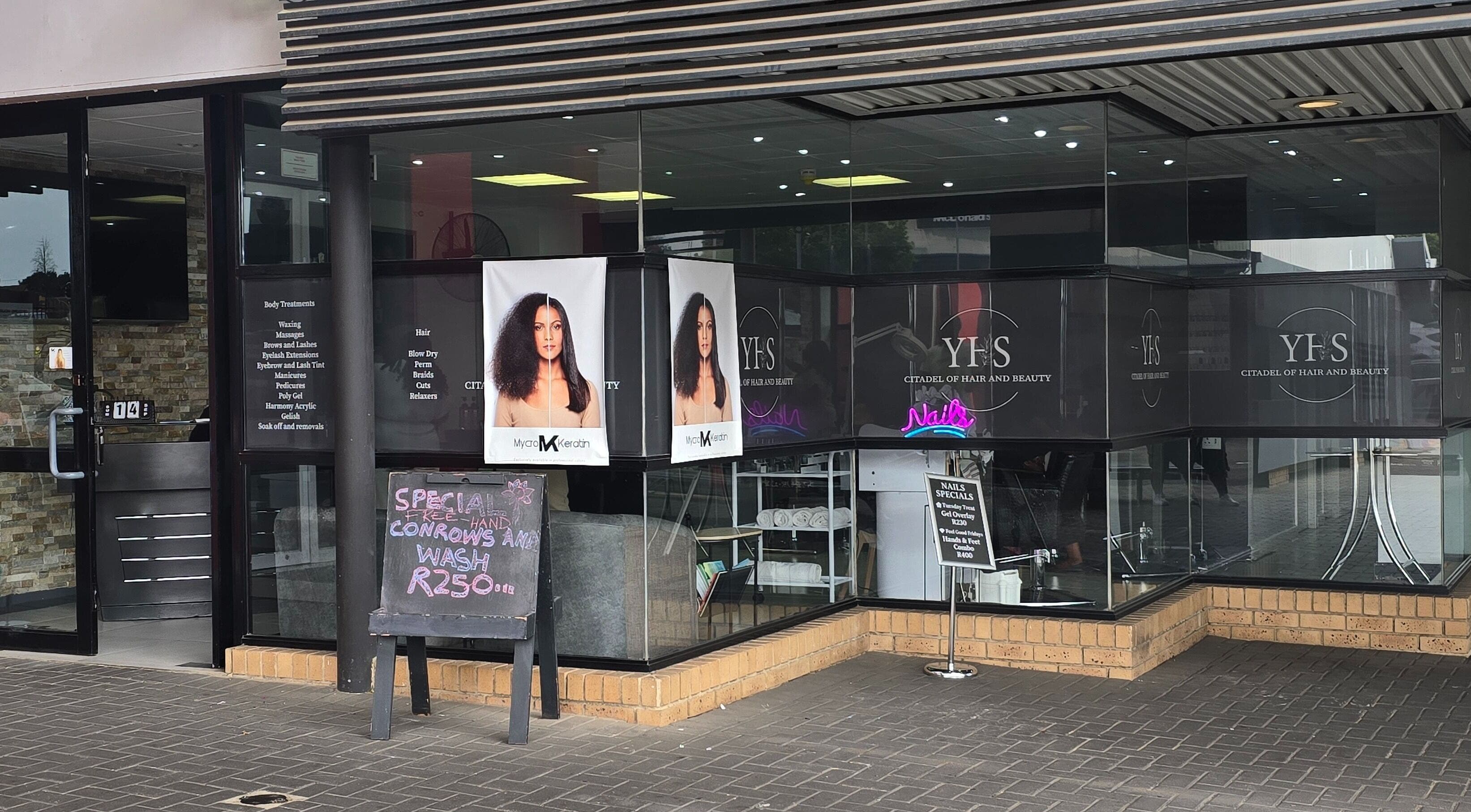 Exterior view of Legacy Heir Studio in Randburg, Gauteng, ZA featuring a sleek glass entrance.