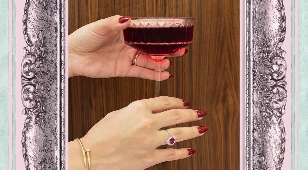 Elegantly manicured hands with a cocktail at La Roza nails and spa 💖🐆💅🏻, Jeddah, SA.