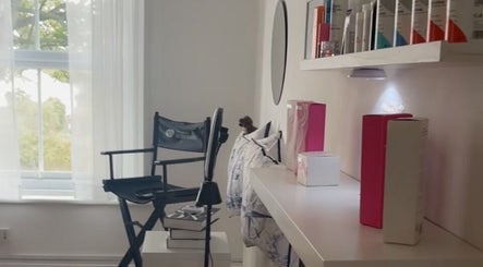 Chic beauty corner at Locksoflove, Whitley Bay, England showcasing products and styling chair.