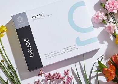 Glo₂Facial by GeneoX SA - Woolworths Canal Walk facial kit surrounded by vibrant flowers in Cape Town, Western Cape, ZA.