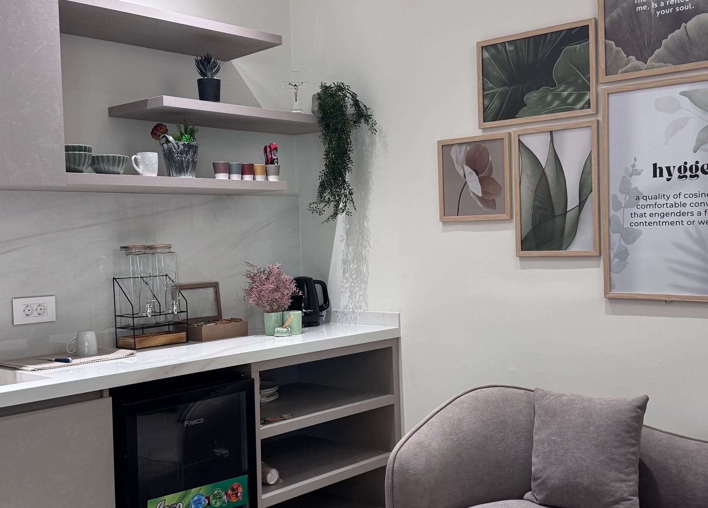 SoulStation Pilates lounge featuring elegant decor and cozy seating in Zalqa, Mount Lebanon Governorate, LB.