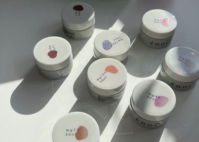 Assorted gel polish jars at Heaps Good Nails in London, England, GB, showcasing vibrant colors.