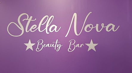 Stella Nova Beauty Bar's elegant wall sign in Bloemfontein, Free State, ZA with purple background.