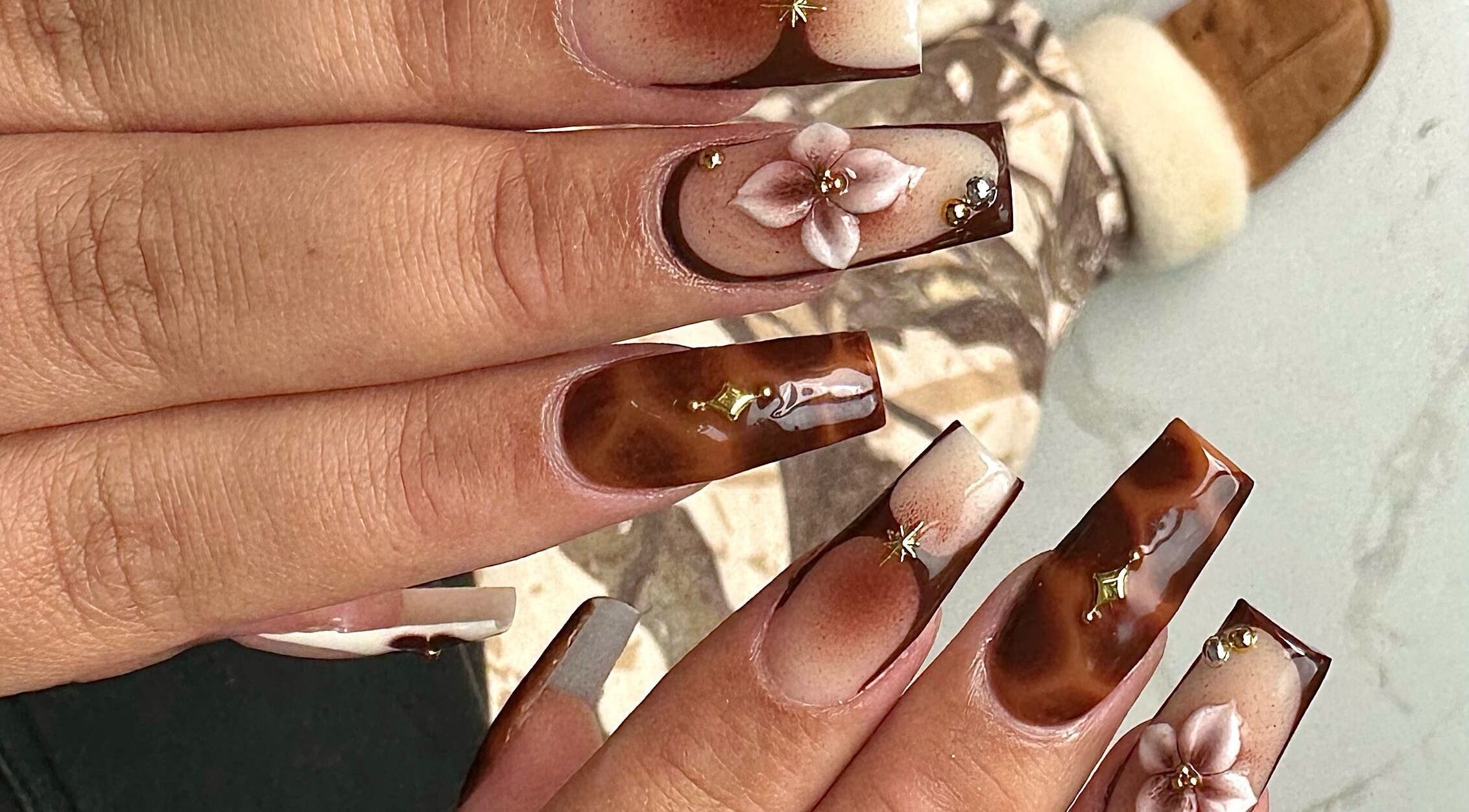 Beautiful floral nail art at MO nails and lashes, Auckland, Auckland, NZ, showcasing intricate design.