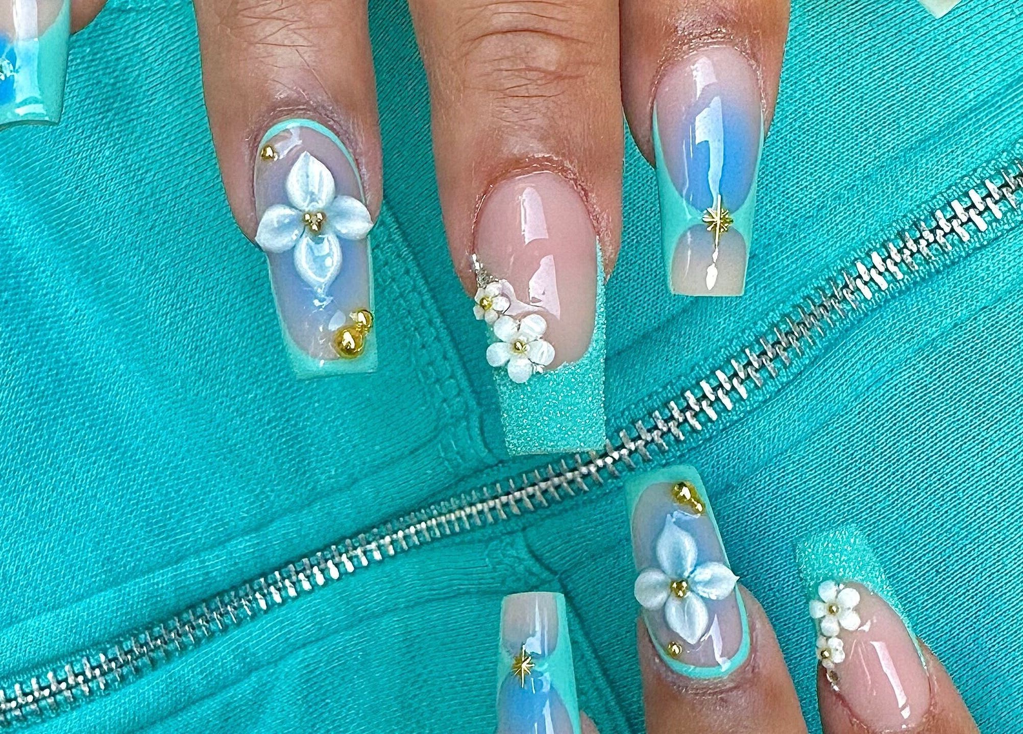 Elegant floral nail art at MO nails and lashes, Auckland, Auckland, NZ, showcasing blue tones and 3D designs.