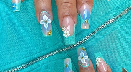 Elegant floral nail art at MO nails and lashes, Auckland, Auckland, NZ, showcasing blue tones and 3D designs.