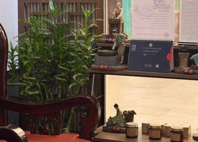 Cozy bamboo corner at TCM Acupuncture Therapy Center, Dubai, AE showcasing traditional decor.