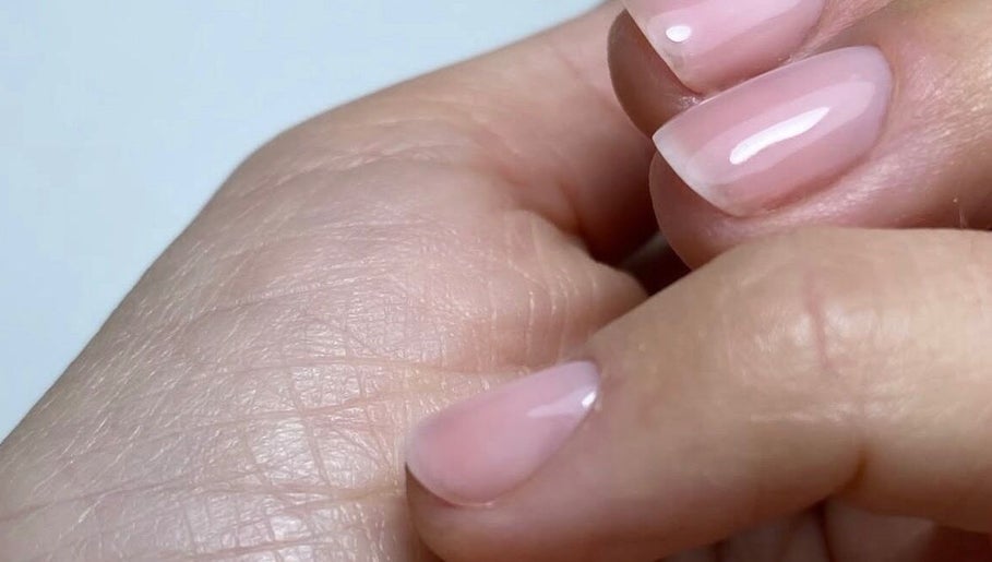 Close-up of glossy nails at Kym Christian in Woodvale, Western Australia, AU, showcasing professional nail care.