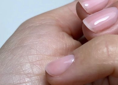 Close-up of glossy nails at Kym Christian in Woodvale, Western Australia, AU, showcasing professional nail care.