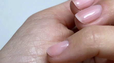 Close-up of glossy nails at Kym Christian in Woodvale, Western Australia, AU, showcasing professional nail care.