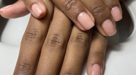 Elegant manicure at Kym Christian, Woodvale, Western Australia, AU. Showcasing flawless natural nail polish.