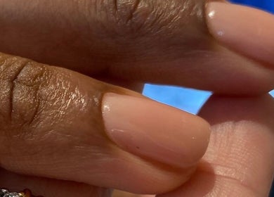 Close-up of elegant nude manicured nails at Kym Christian, Woodvale, Western Australia, AU.