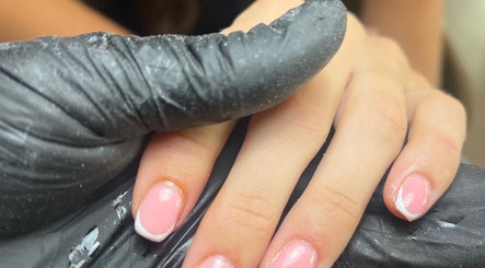 Close-up of manicured nails at C.B.Nails, Bacup, England, GB, showcasing a French polish style.