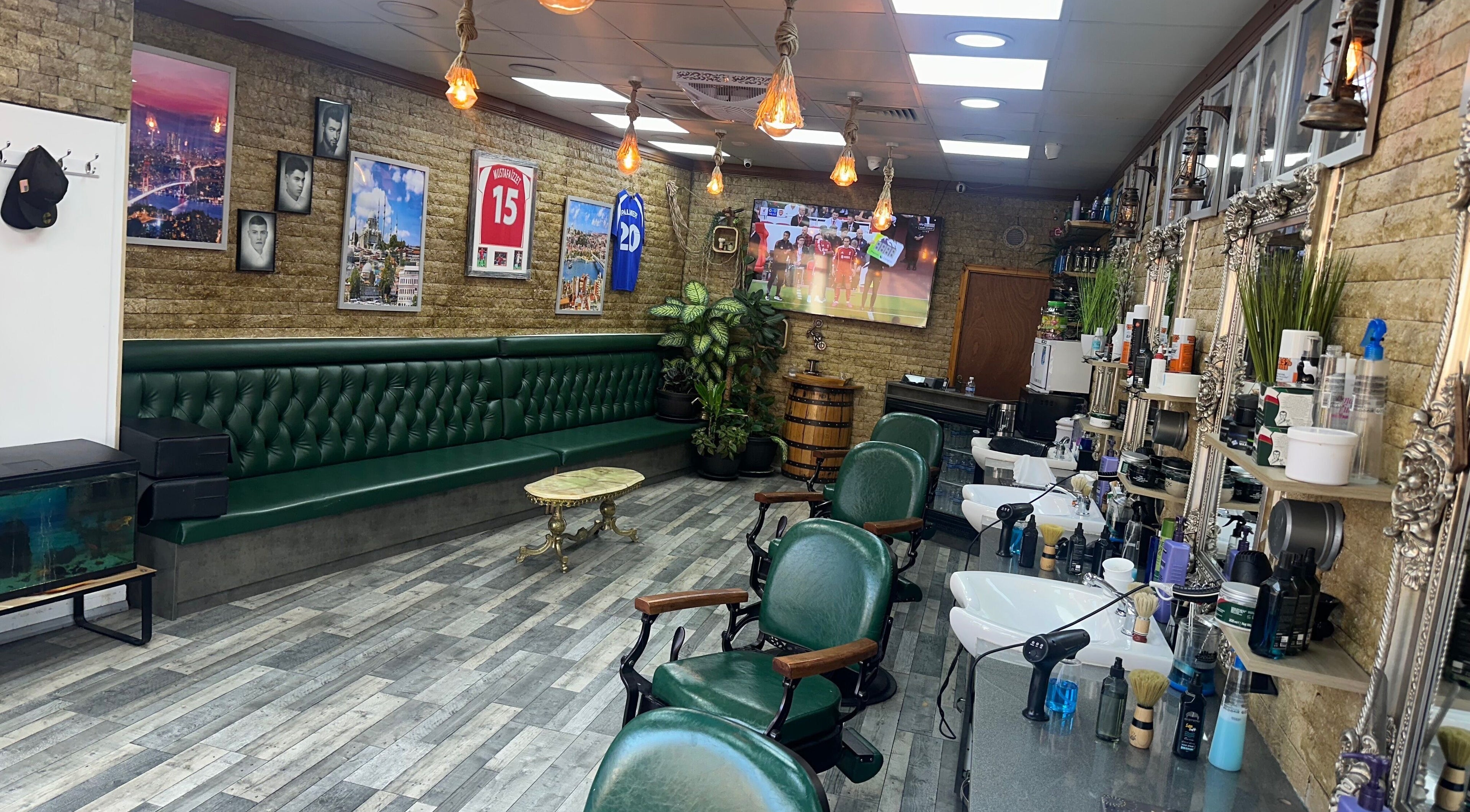 Interior of Istanbul Barber Rosehill in Sutton, England, GB, featuring vintage decor and classic barber chairs.