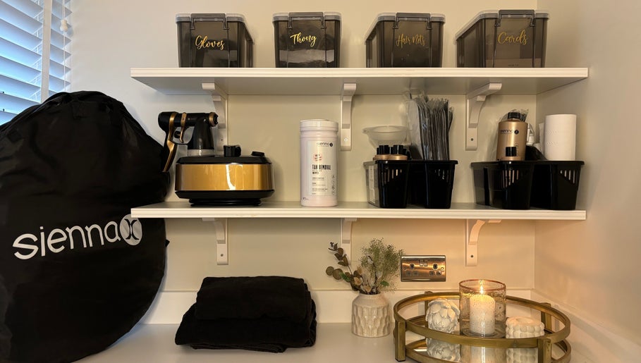 Shelves stocked with tanning supplies at Tanning By Hazel, West Parley, England, GB.