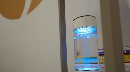Illuminated water feature at The Regen Room, Livingston, Scotland, GB, enhancing the venue's tranquil ambiance.
