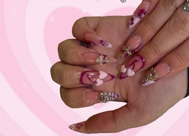 Elegant pink and purple nail art at Kittyscybernails, Federal Heights, Colorado, US.
