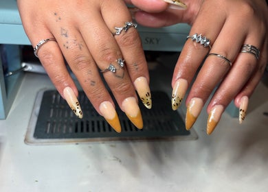 Elegant leopard print nails designed at Kittyscybernails in Federal Heights, Colorado, US.
