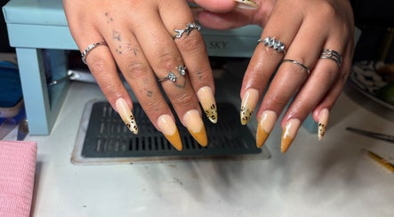Elegant leopard print nails designed at Kittyscybernails in Federal Heights, Colorado, US.