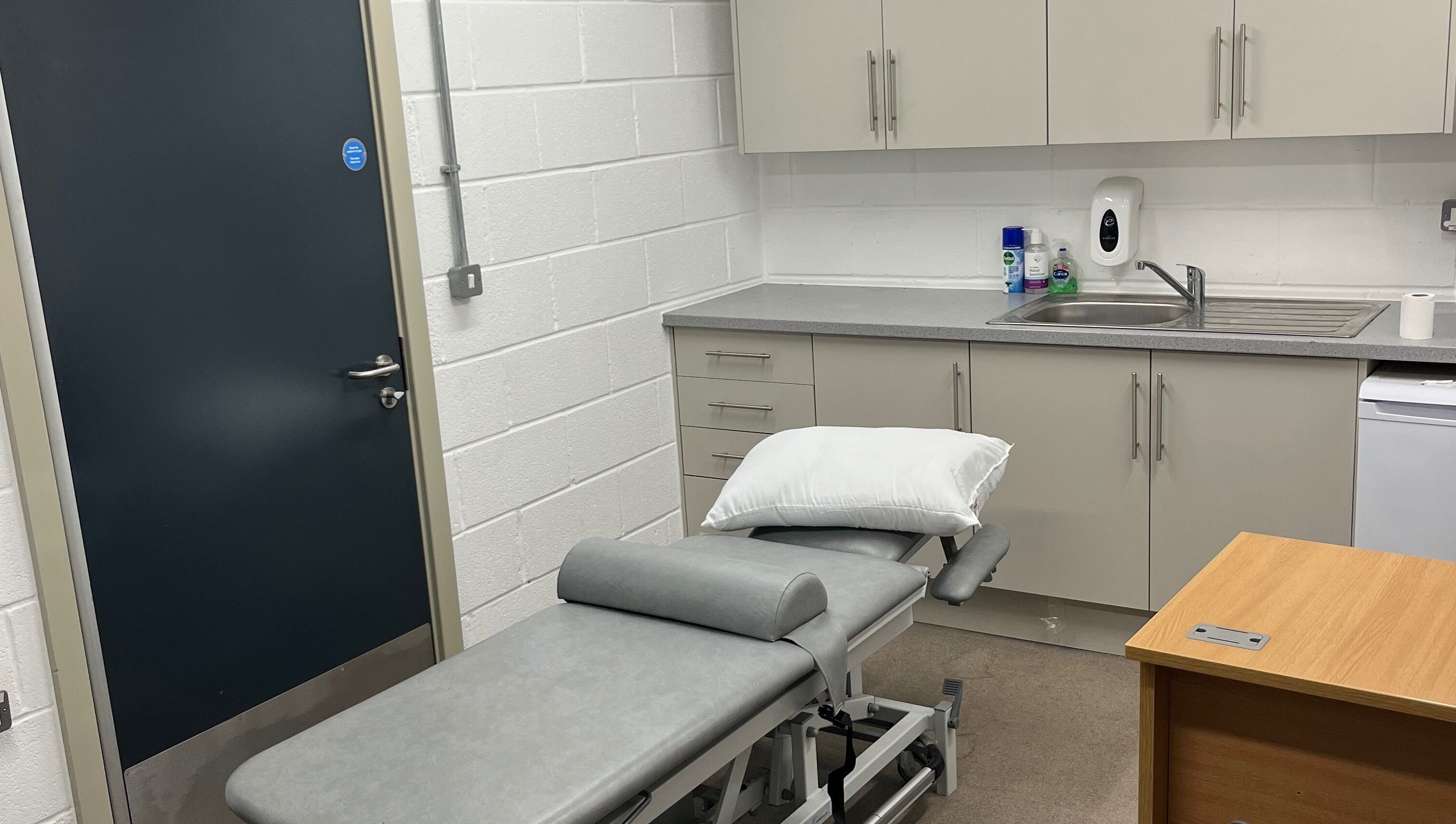 Professional therapy room at LH Sport Therapy in Mumbles, Newton, Wales, GB with treatment table.