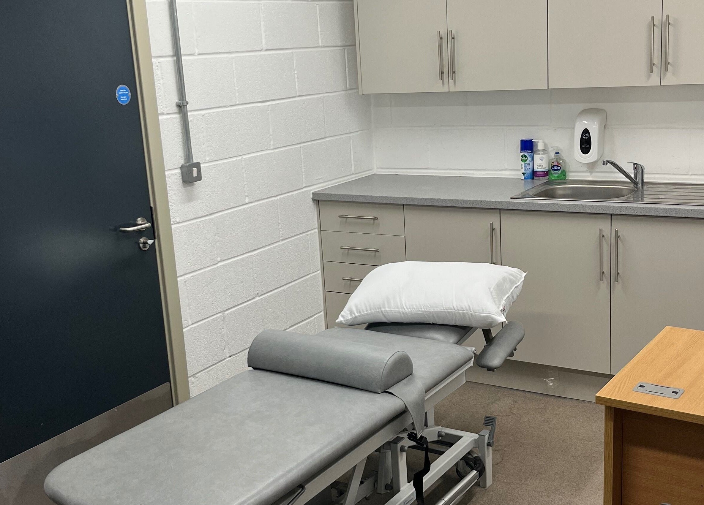 Professional therapy room at LH Sport Therapy in Mumbles, Newton, Wales, GB with treatment table.